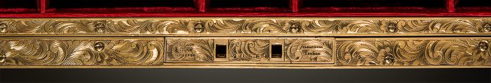 Brass lock plate and internal facing engraved with a floral and scrollwork design, from an antique jewellery box in coromandel with engraved brass inlay.