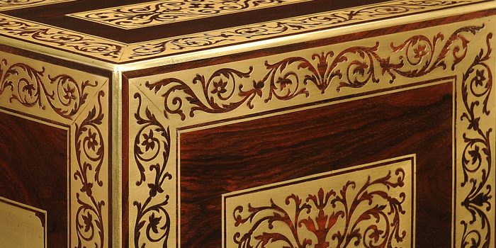 Foliate brass inlay from an antique rosewood jewellery cabinet.