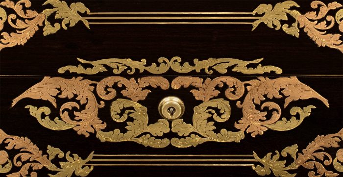 Yellow and rose brass foliate and scrollwork inlay from a French antique jewellery box in ebony.