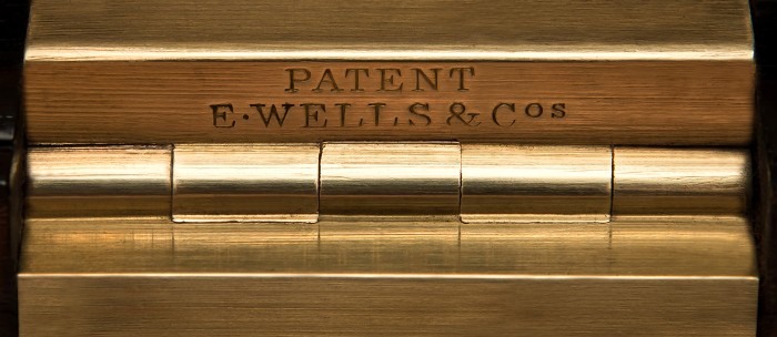 E. Wells & Co Patent brass hinge.