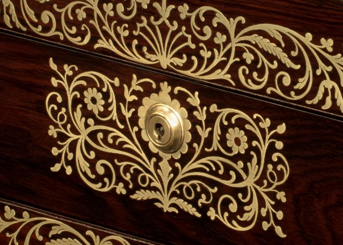 Inlaid foliate brass designs on an antique jewellery box in rosewood, by Charles Essex. Brass Foliate Designs on a Antique Jewellery Box in Rosewood, by Charles Essex.