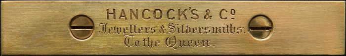 Hancock's & Co engraved brass retailer's plate.