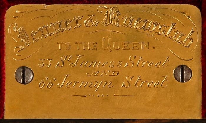 Engraved brass plate bearing the manufacturer's and retailer's mark of, Jenner & Knewstub of 33 St James's Street and 66 Jermyn Street, London.