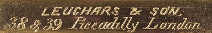 'Leuchars & Son. 38 & 39 Piccadilly London.' engraved brass manufacturer's plate from an antique jewellery case in coromandel with silver mounted monograms.