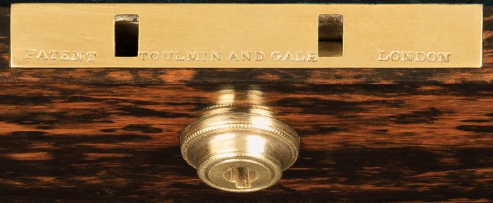 Bramah Patent lock plate engraved with 'Toulmin & Gale London'.