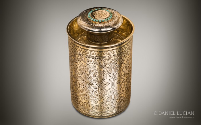 Silver-gilt spirit bottle and beaker set from an antique dressing case by Asprey & Sons.