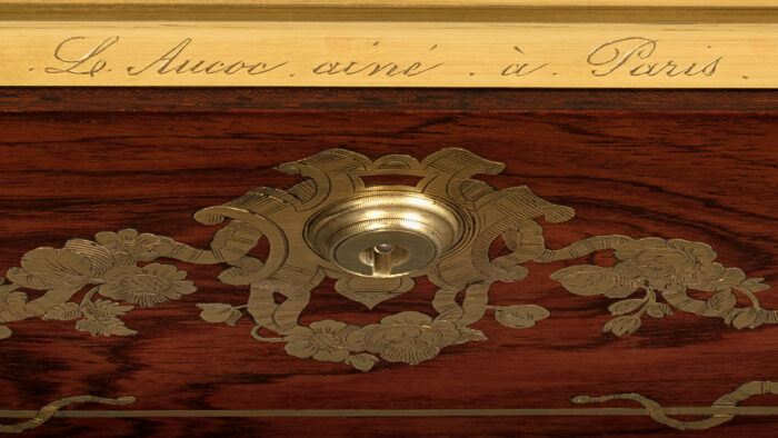 ‘L. Aucoc Ainé à Paris’ engraved manufacturer’s mark on an antique nécessaire de voyage.