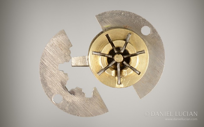 Antique self-locking Bramah patent lock disassembled.