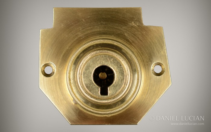 Antique self-locking Bramah patent lock disassembled.
