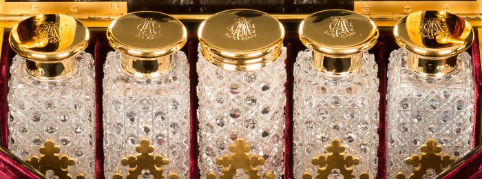 Antique 'hobnail' cut-glass vanity bottles taken from an Asprey dressing case.