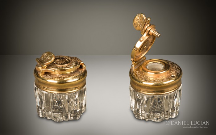 Travelling inkwell from an antique dressing case with silver-gilt / gold fittings by Asprey & Sons.