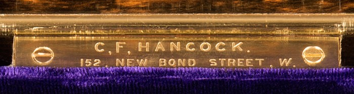 C. F. Hancock engraved brass retailer's plate.