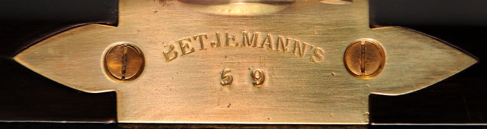 George Betjemann & Sons patent stamp plate from an Asprey antique jewellery box in coromandel with Betjemann Patent mechanism.