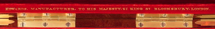 'Edwards, Manufacturer to His Majesty, 21 King St, Bloomsbury, London' gold tooled onto leather.