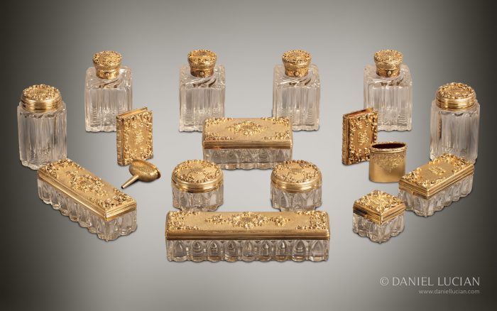 Silver-gilt bottles, jars and accessories from an antique dressing case from Asprey, displayed at the Great Exhibition of 1851.