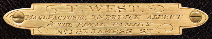 ‘F. West - Manufacturer To Prince Albert & The Royal Family - No.1 St James's St.’ engraved brass manufacturer’s plate from an antique dressing case in coromandel with silver fittings, by Fitzmaurice West.
